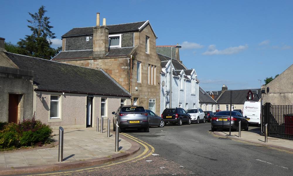 Angle Street at the back of the Cross (Main Square).